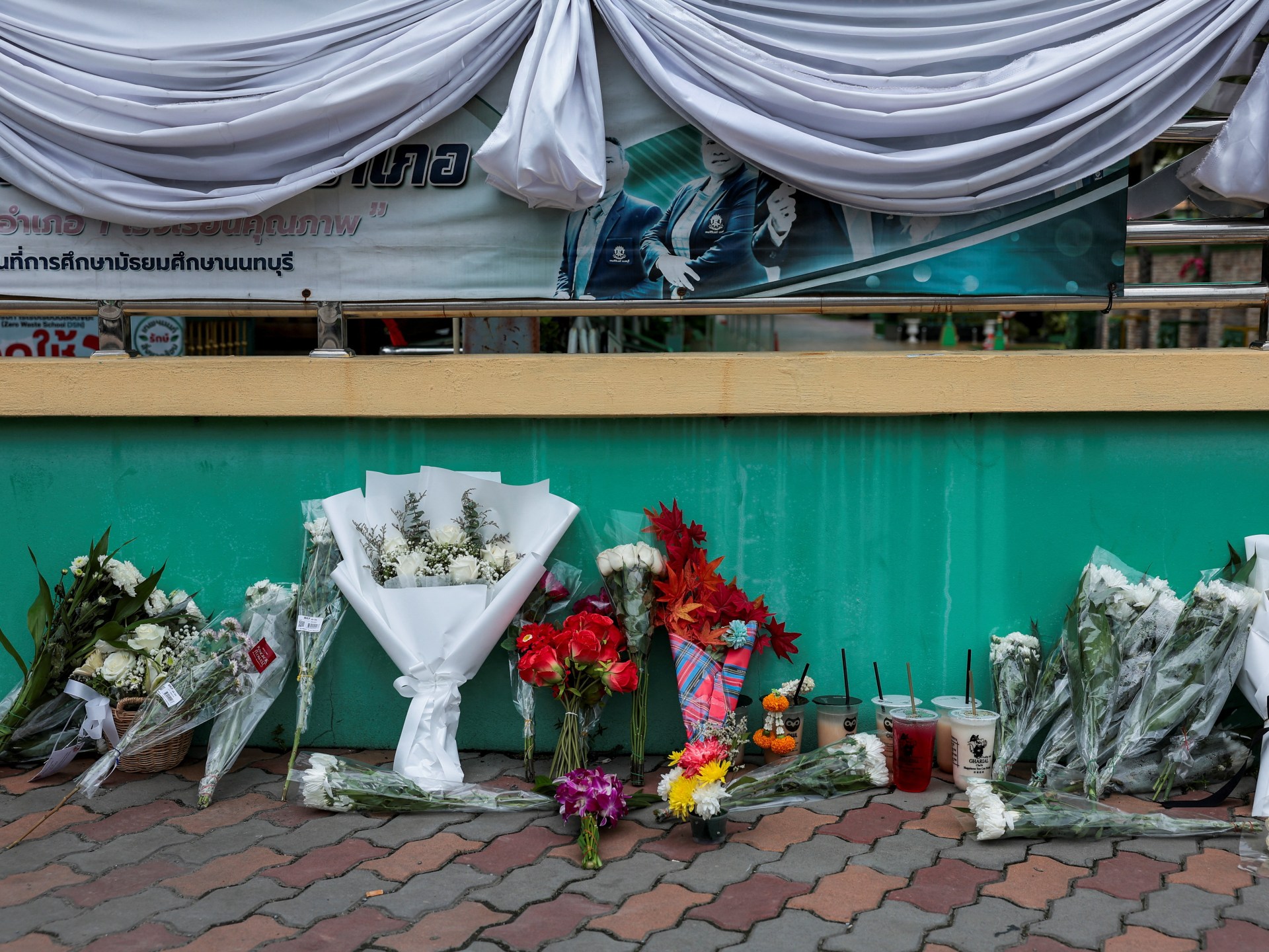 Families collect victims’ bodies after Thailand school shooting