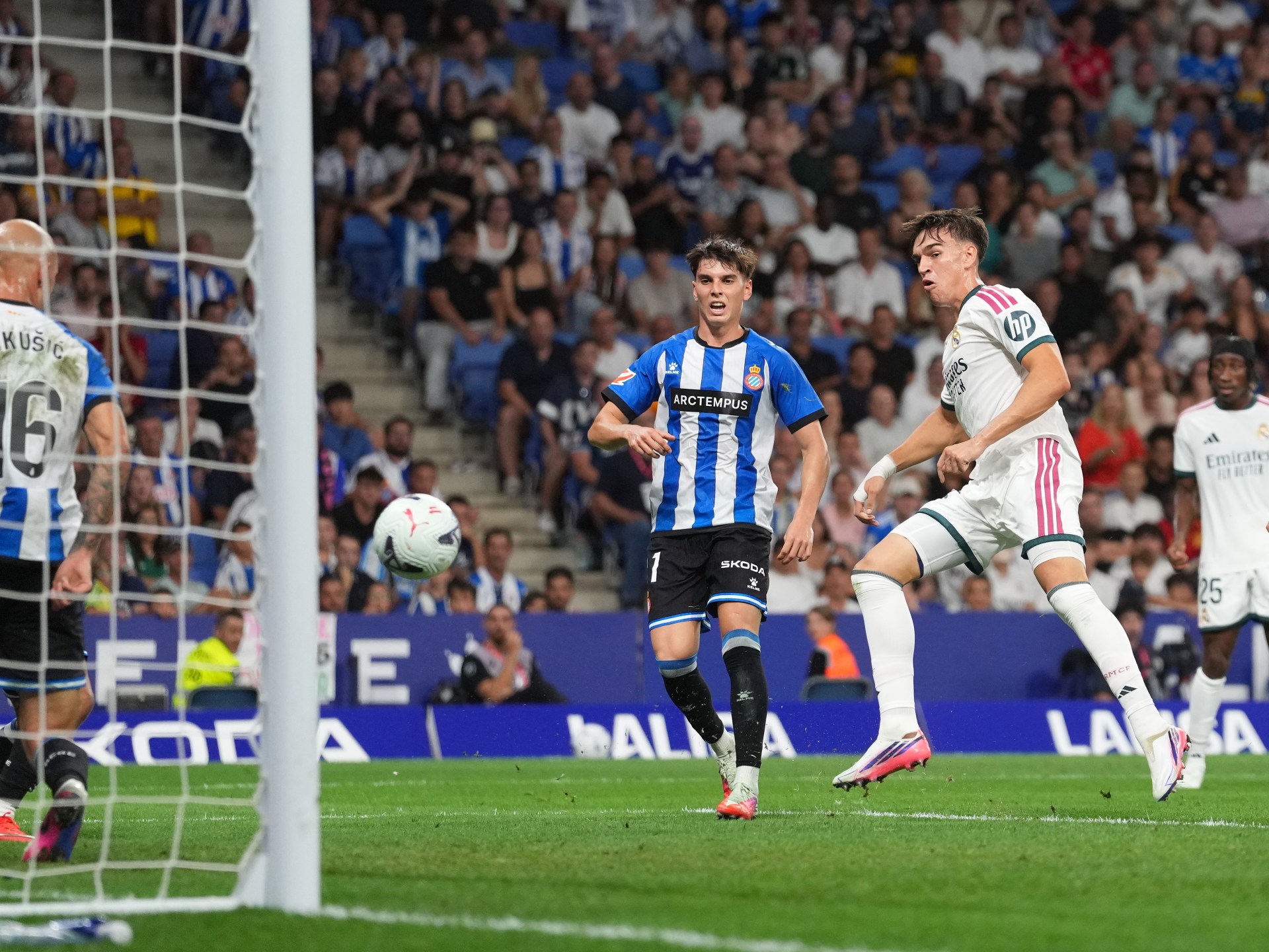 Real Madrid edge Espanyol 2-1 in Mourinho’s first game back