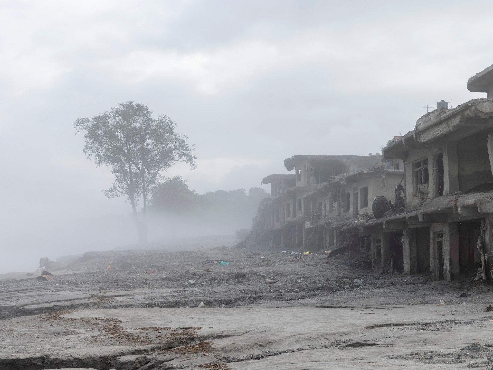 Nepal marks final mourning day while flood rescue teams search
