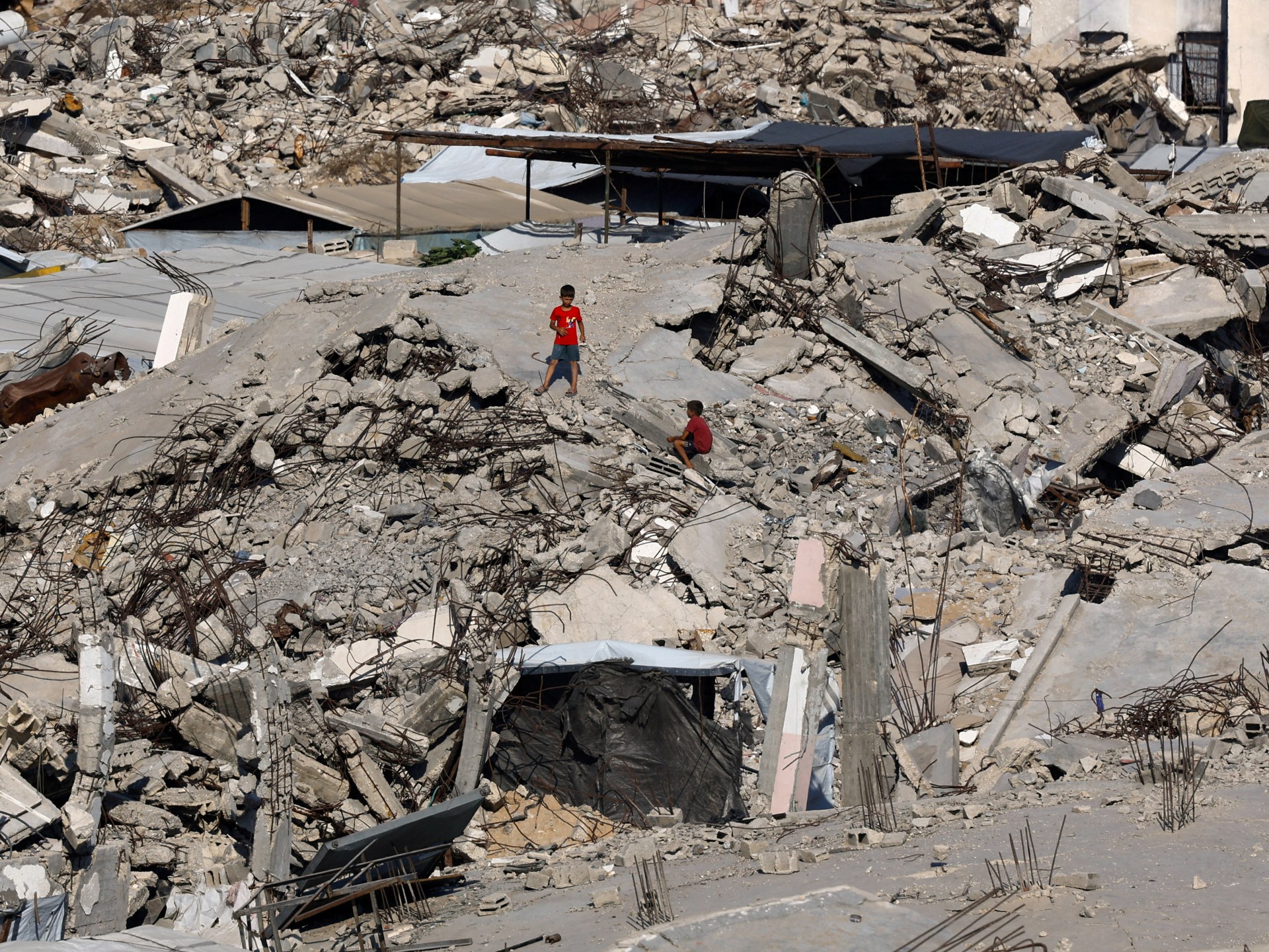 Children rescued after residential building collapses in Gaza City