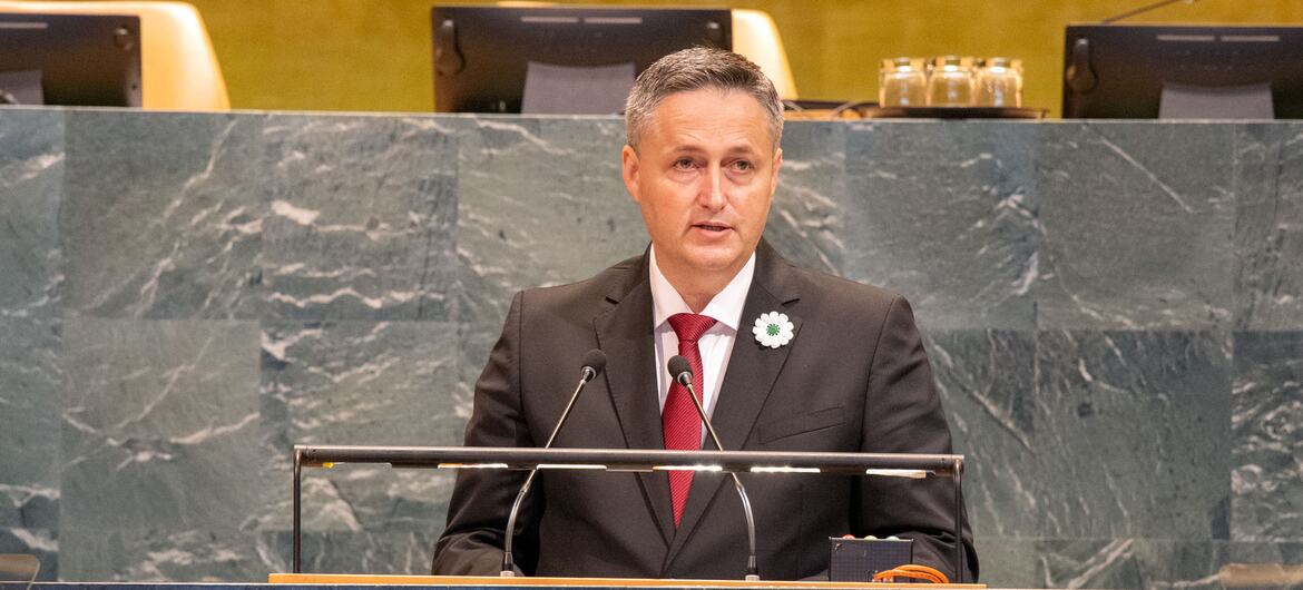 A man speaking at a United Nations podium during an event on the International Day of Reflection and Commemoration of the 1995 Genocide in Srebrenica.