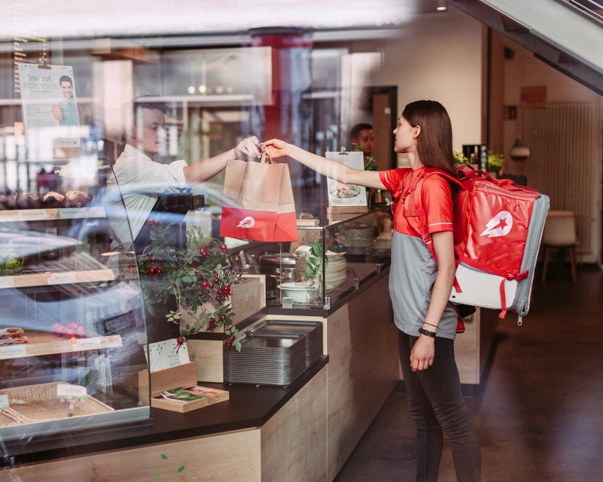 Uber Agrees to Buy Germany’s Delivery Hero for $14.8 Billion to Expand Global Reach